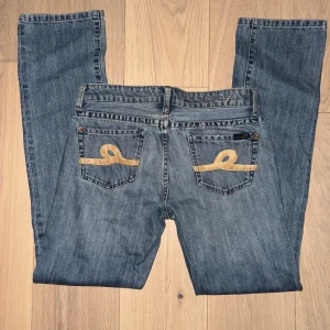 Low waist bootcut jeans - w28