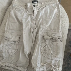 Cargo Shorts - Vintage Ralph Lauren beige cargo shorts.