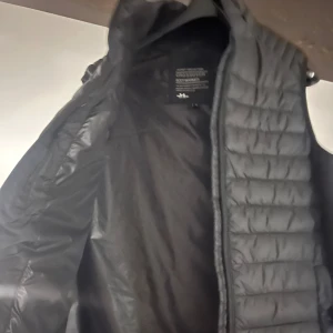 Väst - En helt ny crossover väst oanvänd 