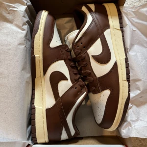 Nike dunk low cacao wow - Nike dunk low cacao wow, helt nya, finns i storlekarna 39, 40.5, 42, 42.5
