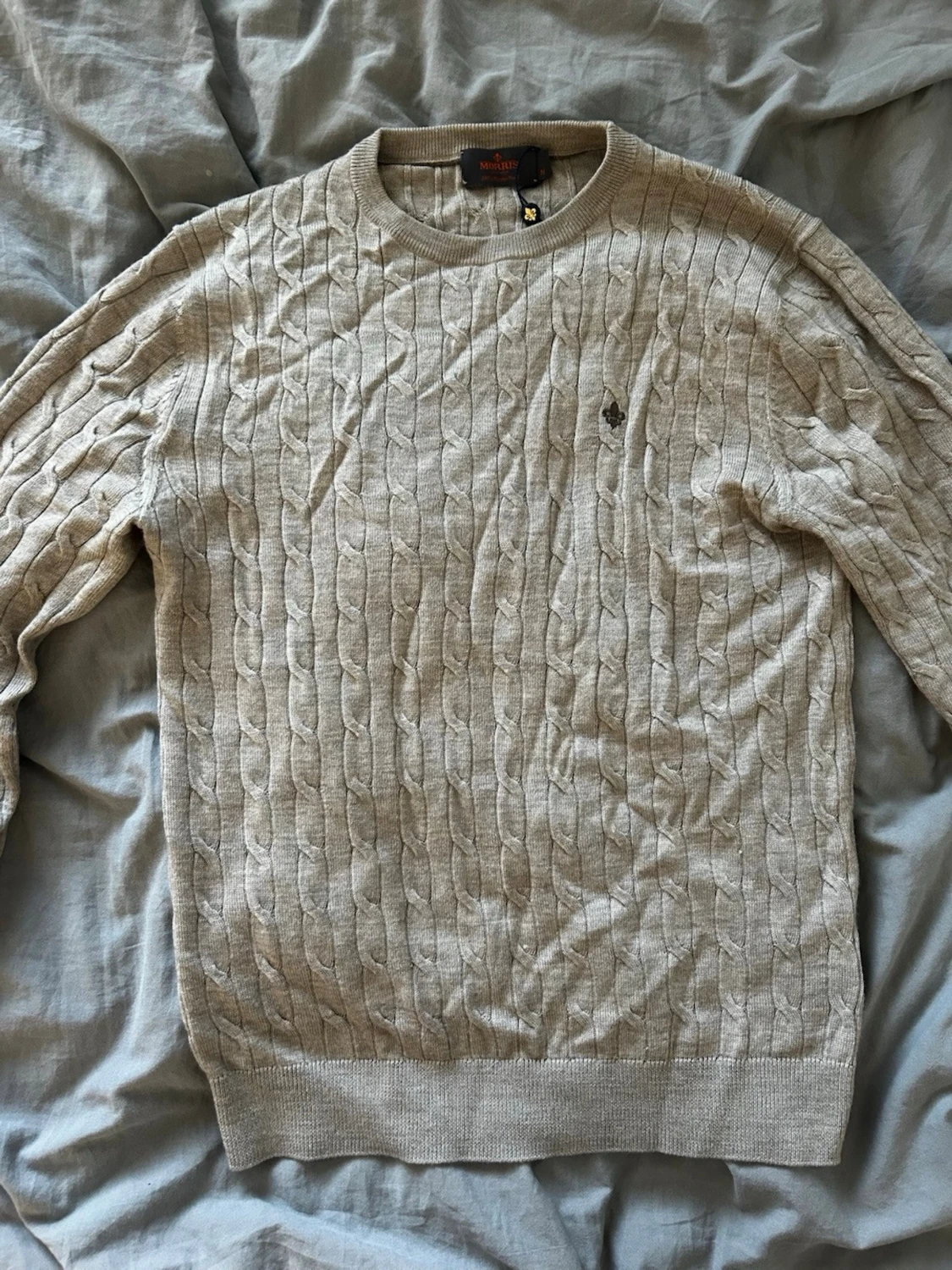 Oanvänd beige stickad Morris crewneck