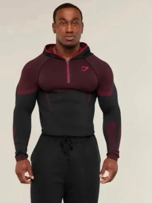 Gymshark OnyxV5 Röd - Helt ny och oanvänd Gymshark Onyx 5.0 Seamless Hoodie i Röd, storlek M – Muscle Fit. Exklusiv och limiterad Onyx 5.0-modell med kraftig seamless-konstruktion och tight, skulpterande passform som framhäver fysiken. Utvecklad för träning med stretchigt premiumtyg och hög komfort. Fortfarande helt ny i originalförpackningen.