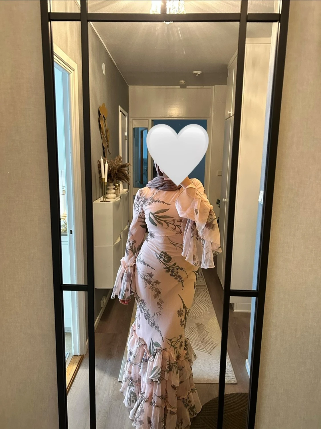 Ljusrosa långklänning med volanger