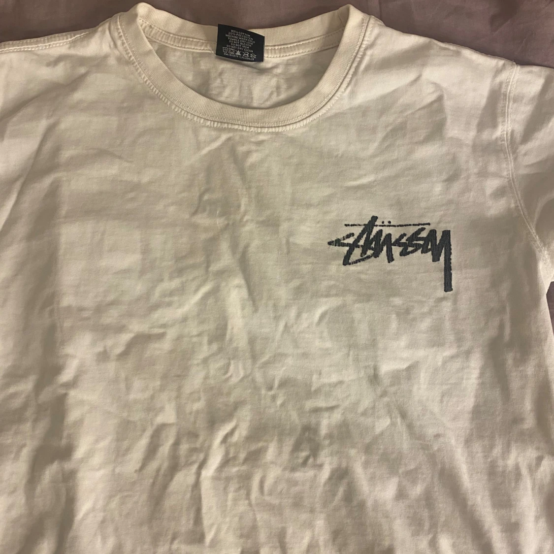Vit t-shirt från Stüssy med tryck