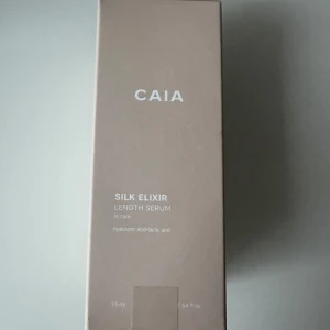 Hårserum - Hårserum från Caia, förpackningen är öppnade men ej produkten