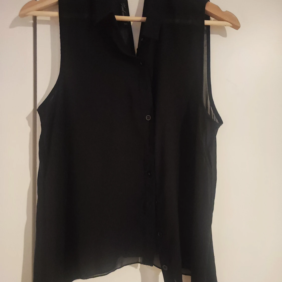 Svart ärmlös blus - 1