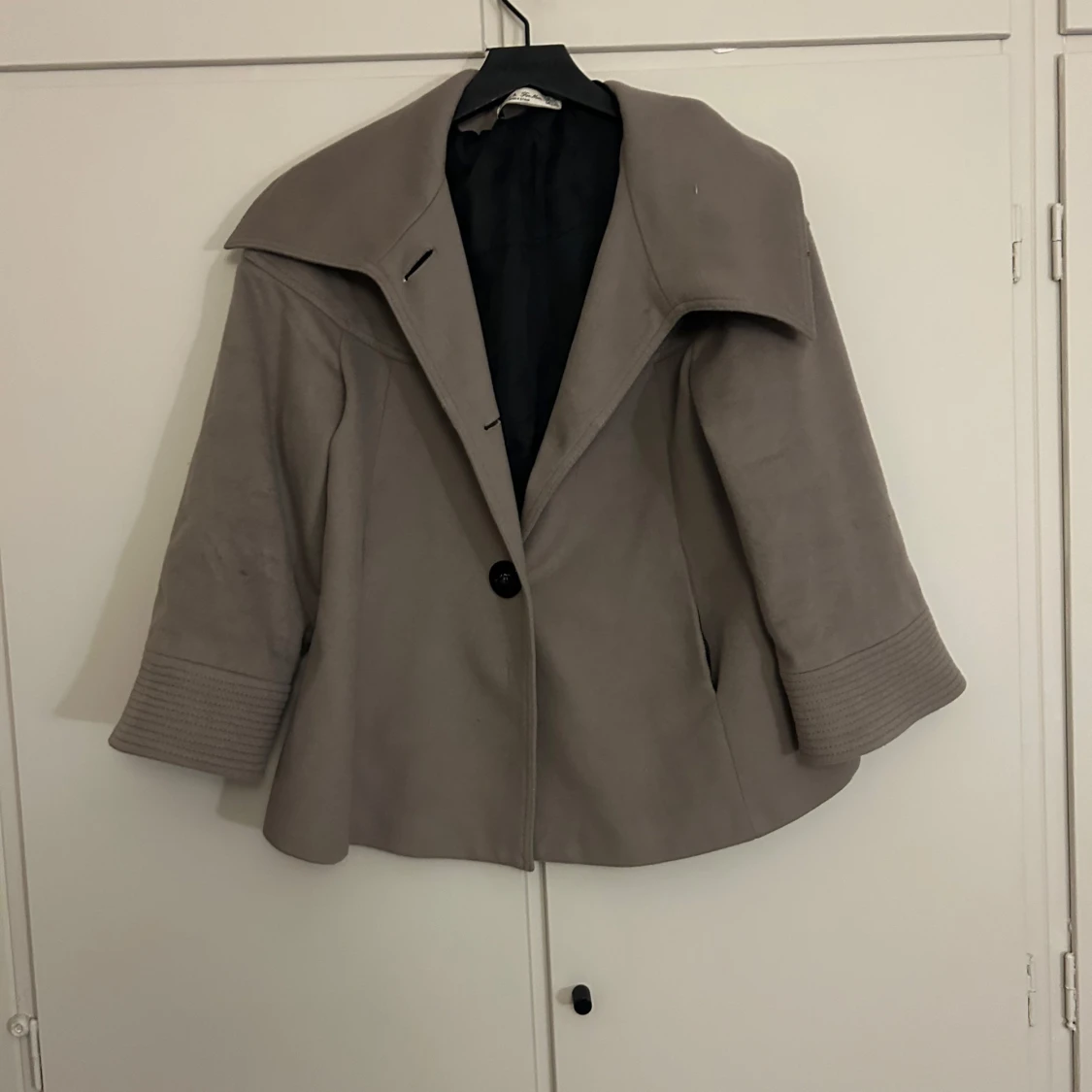 Beige kappa från Zara