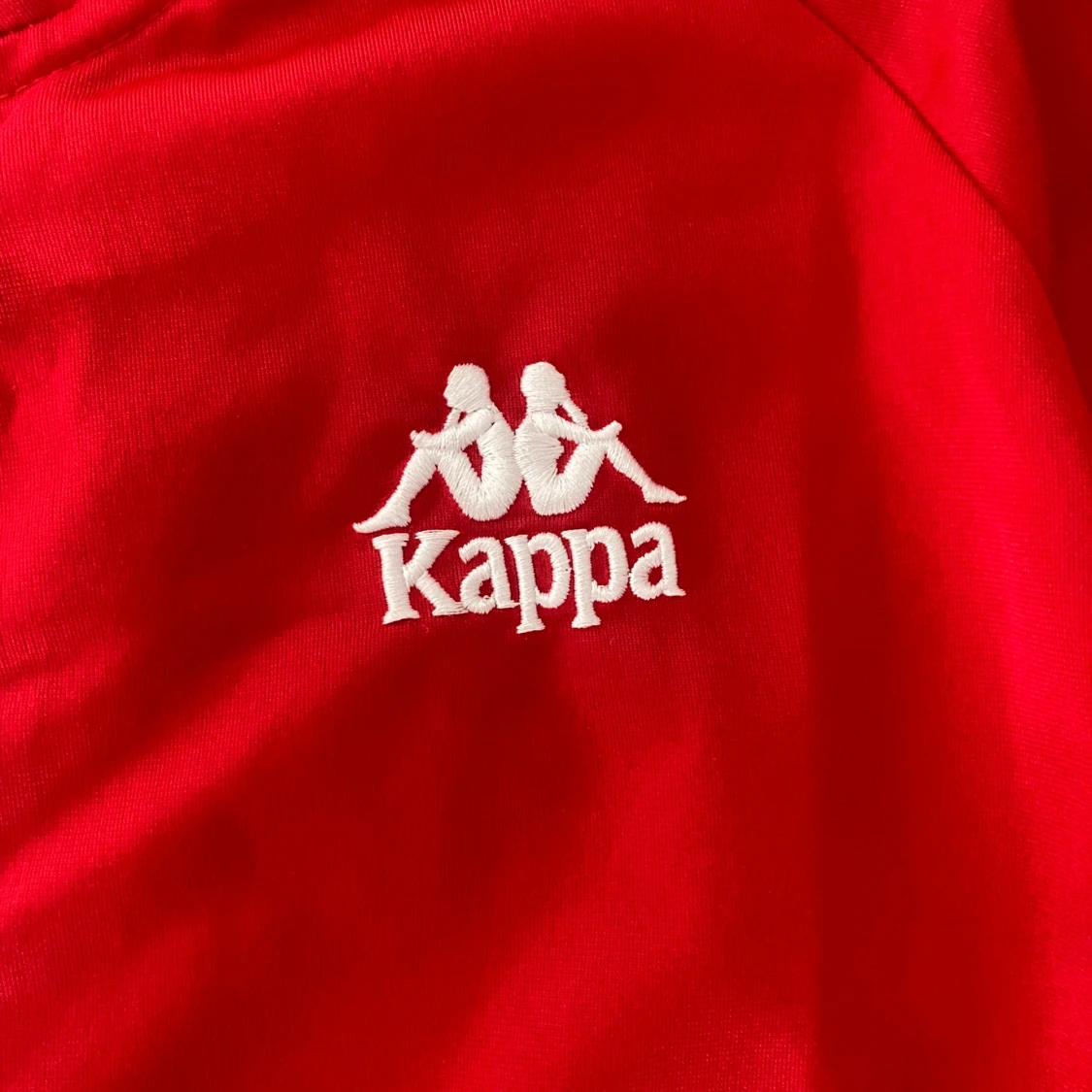 Röd träningsjacka från Kappa - 90