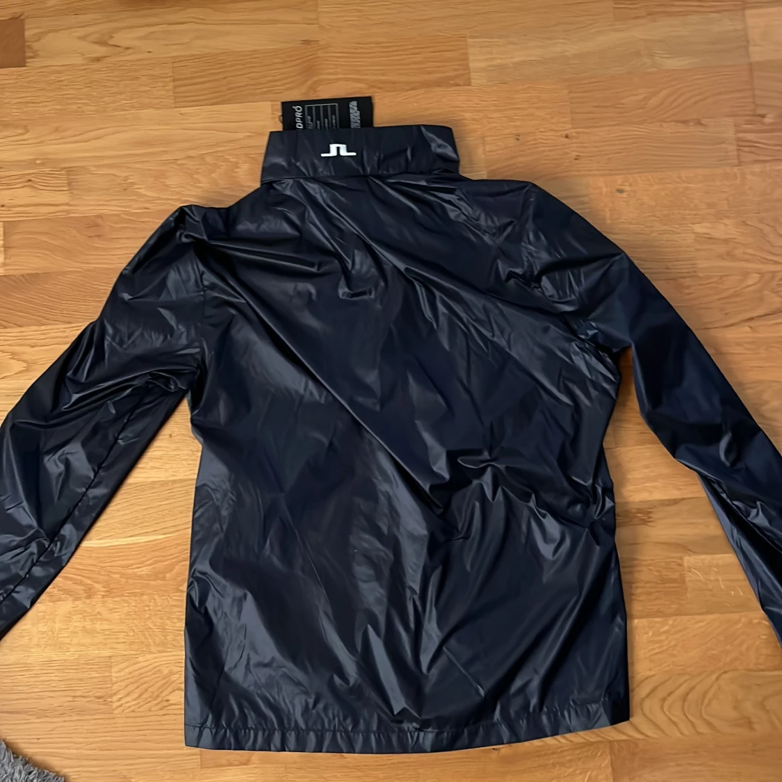 J Lindeberg jacka  - 91