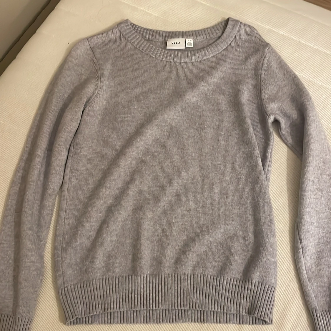 Grå stickad tröja 