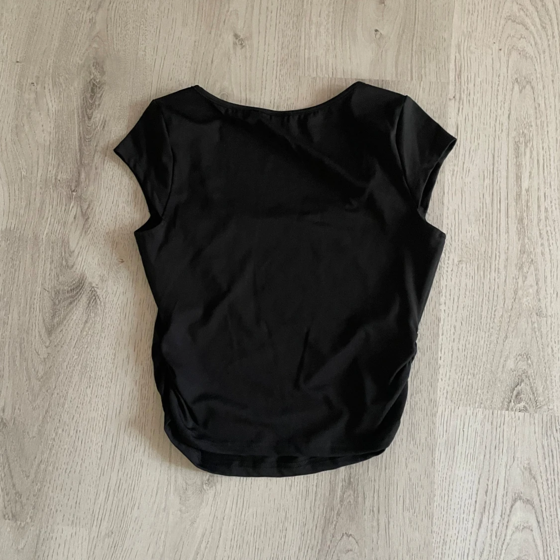 Svart kortärmad topp