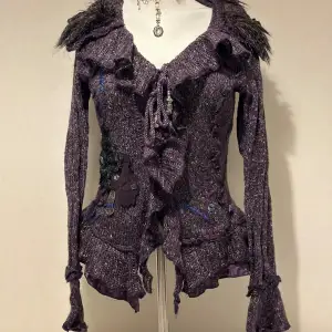 Excellent condition French purple fairy grunge knit crochet asymmetrical  jumper gothic  faux fur patchwork witchy whimsigoth flared ruffled wool cardigan with cottage boho floral detail Will fit small perfectly  Size S /M  Made of 15% wool 