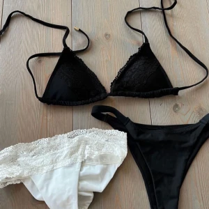 Elsa & Rose bikini  - Bikini från Elsa and Rose me scrunch samt ett par Nelly bikinibyxor, oanvänd Storlek: XS-S Färg: Svart Märke: Elsa & Rose Skickas i tillhörande necessär  Säljes som ett sett!   Kika gärna in på mina andra annonser, säljer fler bikinis.