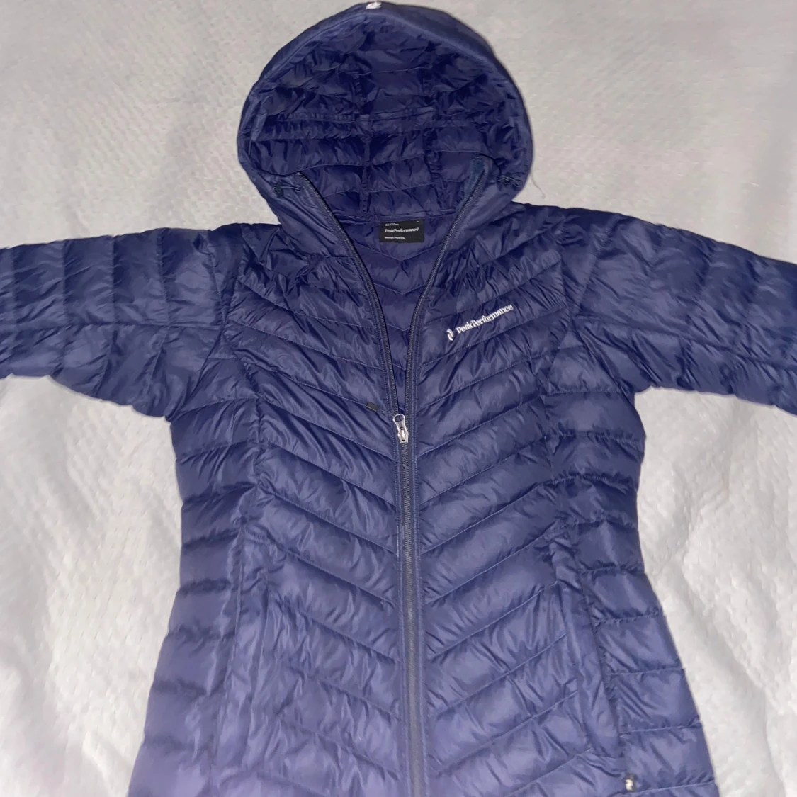 Blå dunjacka från Peak Performance - 90