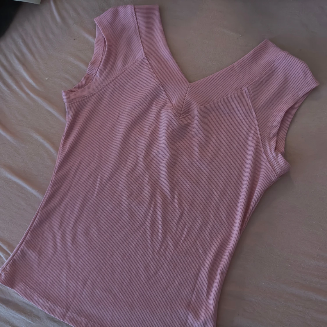 Rosa ribbad ärmlös topp