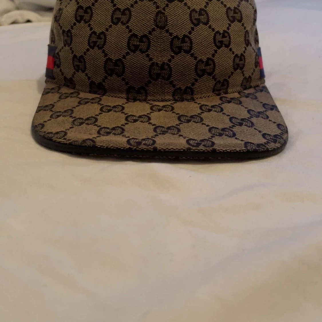 Beige keps med monogram från Gucci - 90