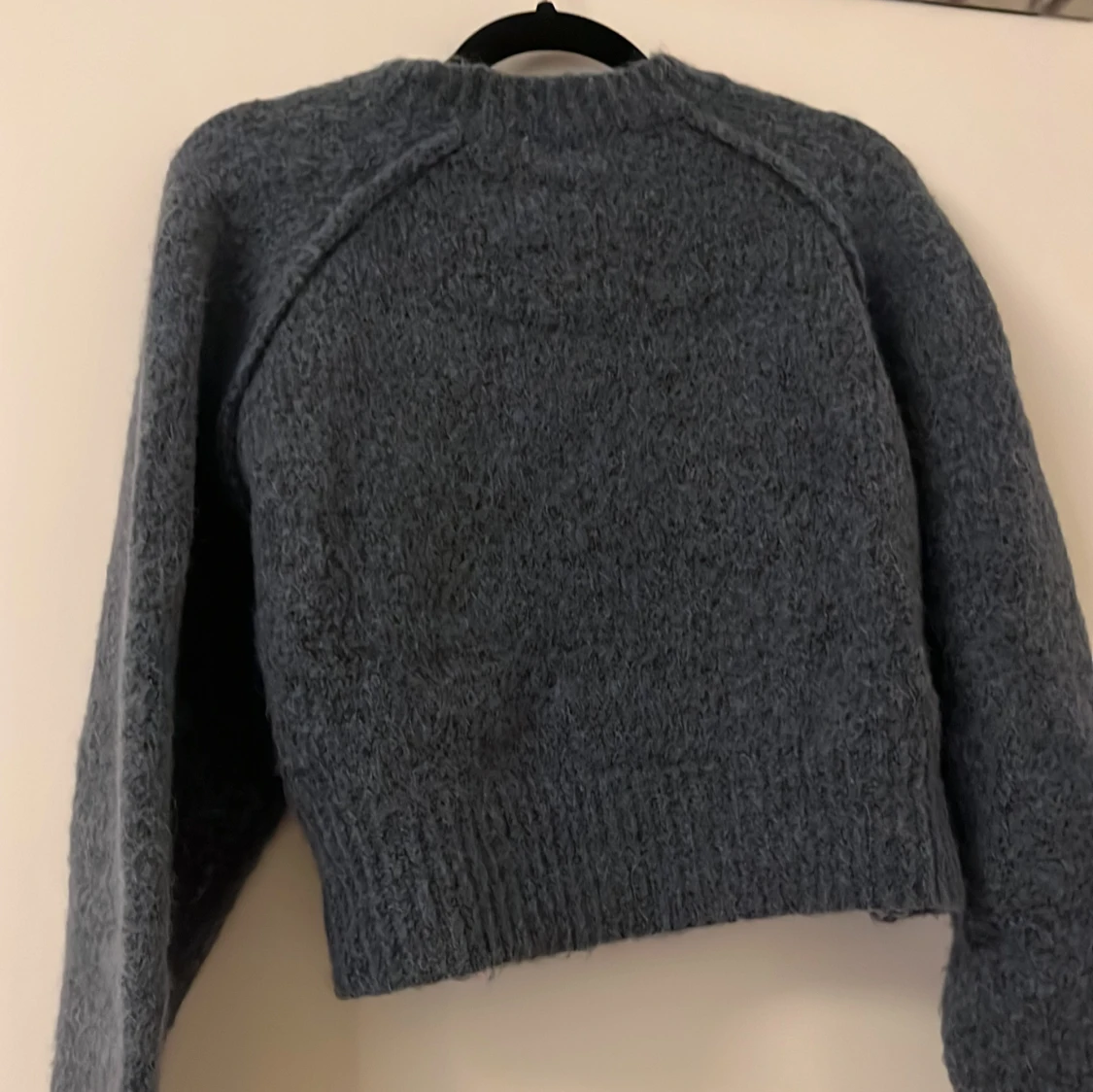 Blå stickad tröja - 90