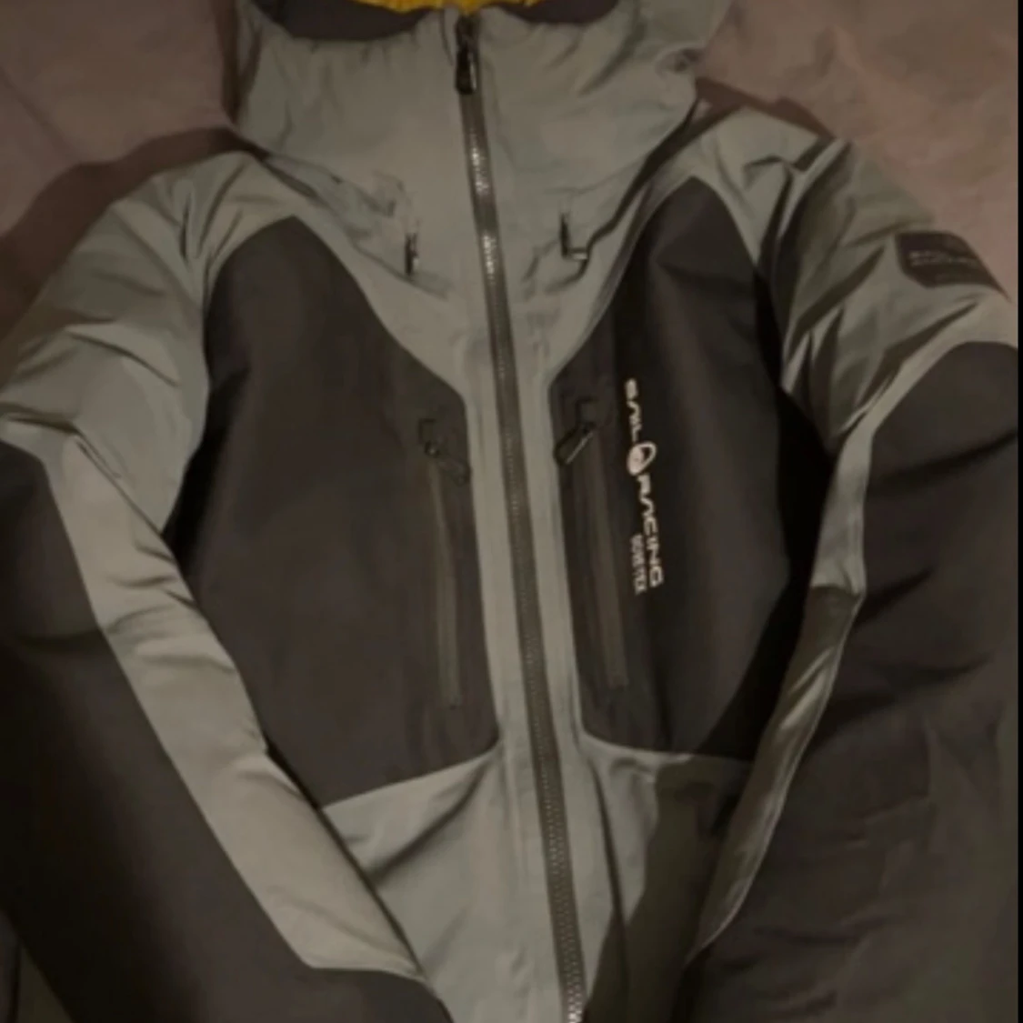 Sail racing pole down