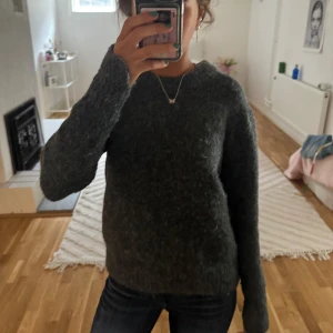 Stickad tröja  - Stickad tröja från hm mörkgrå