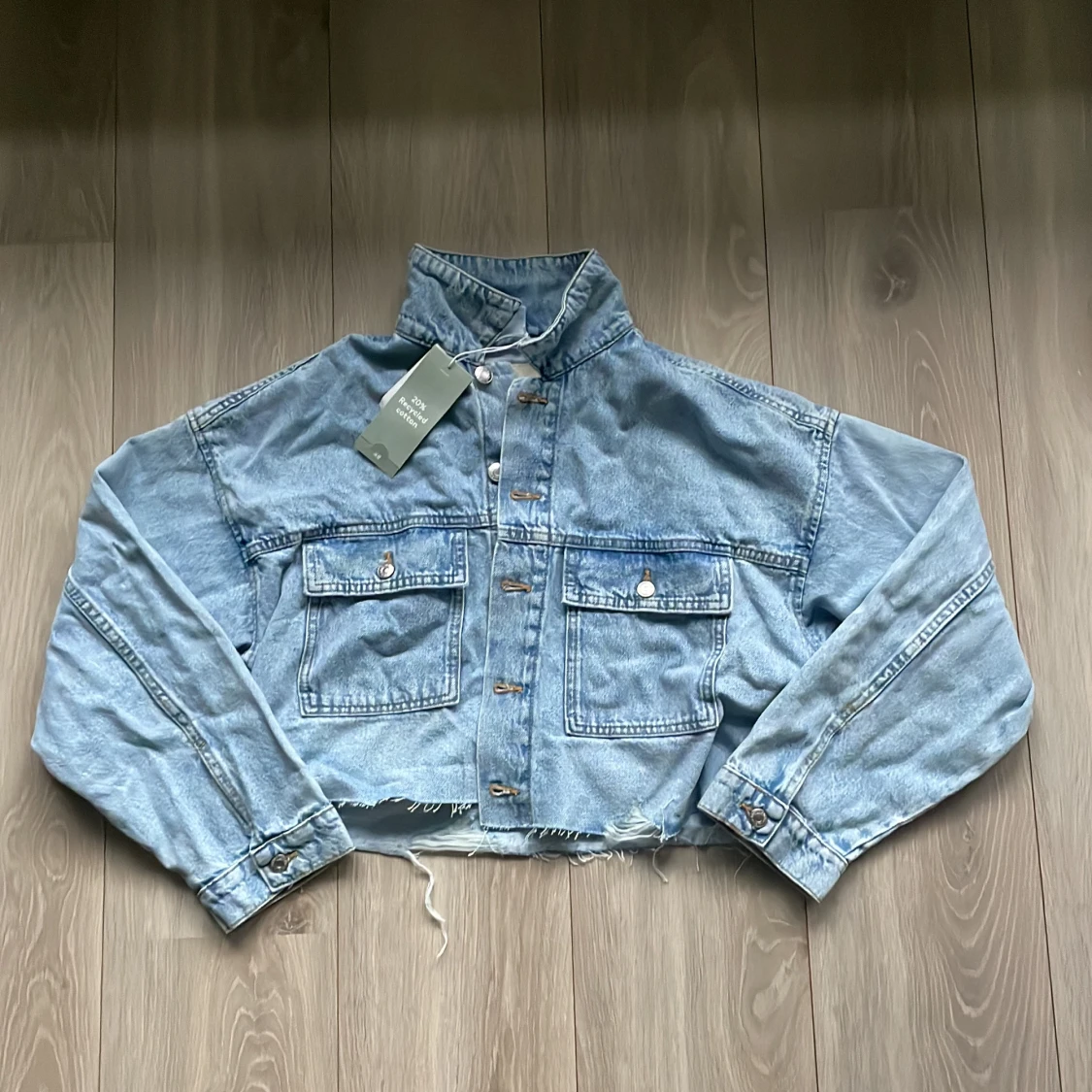 Ljusblå croppad jeansjacka H&M