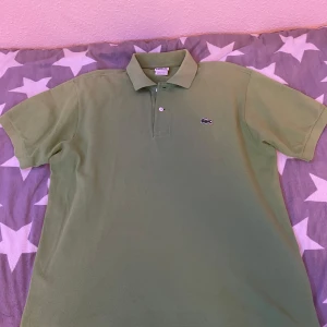 Lacoste piké  - Lacoste piké i storlek 5 motsvarar typ S/M