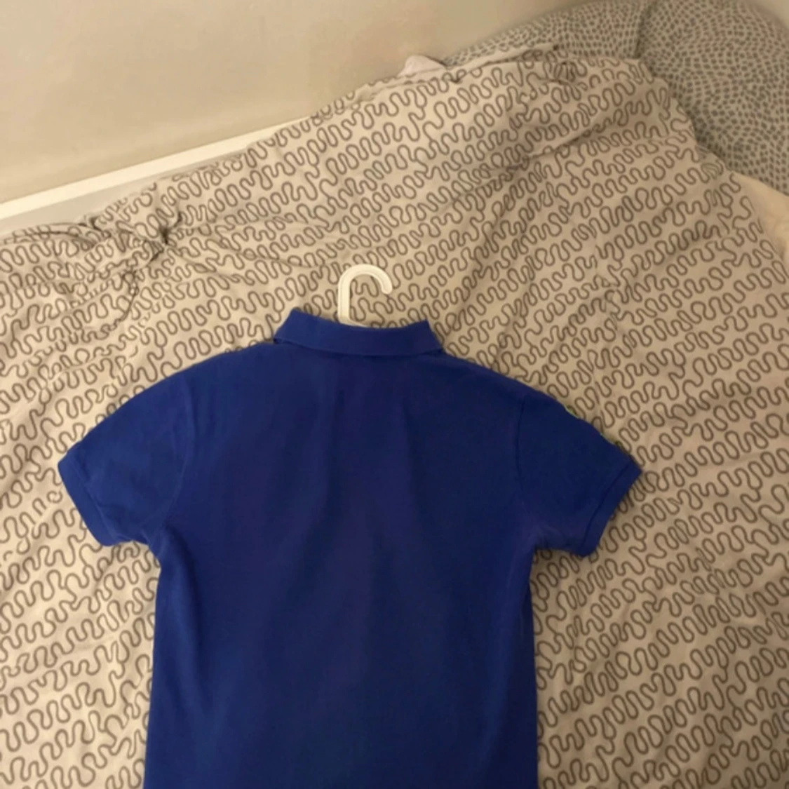 Blå pikétröja från Ralph Lauren - 90