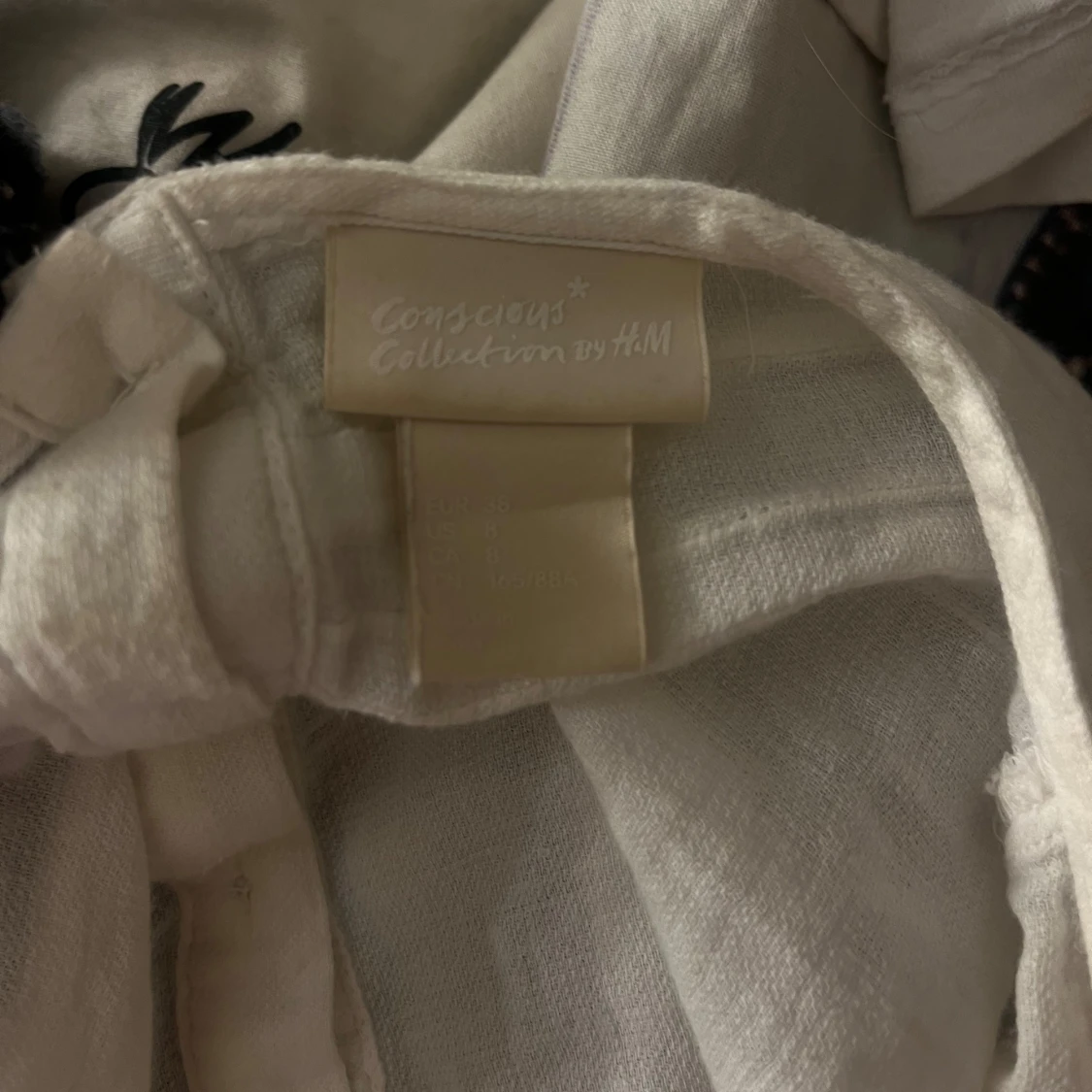 Vit blus från H&M Conscious Collection - 90