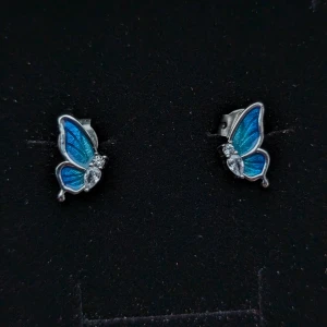 Örhängen, Ring, Halsband, Armband (fjäril set) - Smycken i silver S925, oanvänt. Har två identiska sets därav två olika annonser.