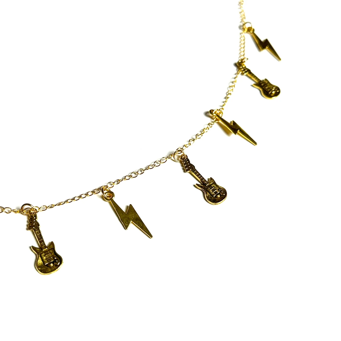 Guldfärgat accessoarsmycke  - 1