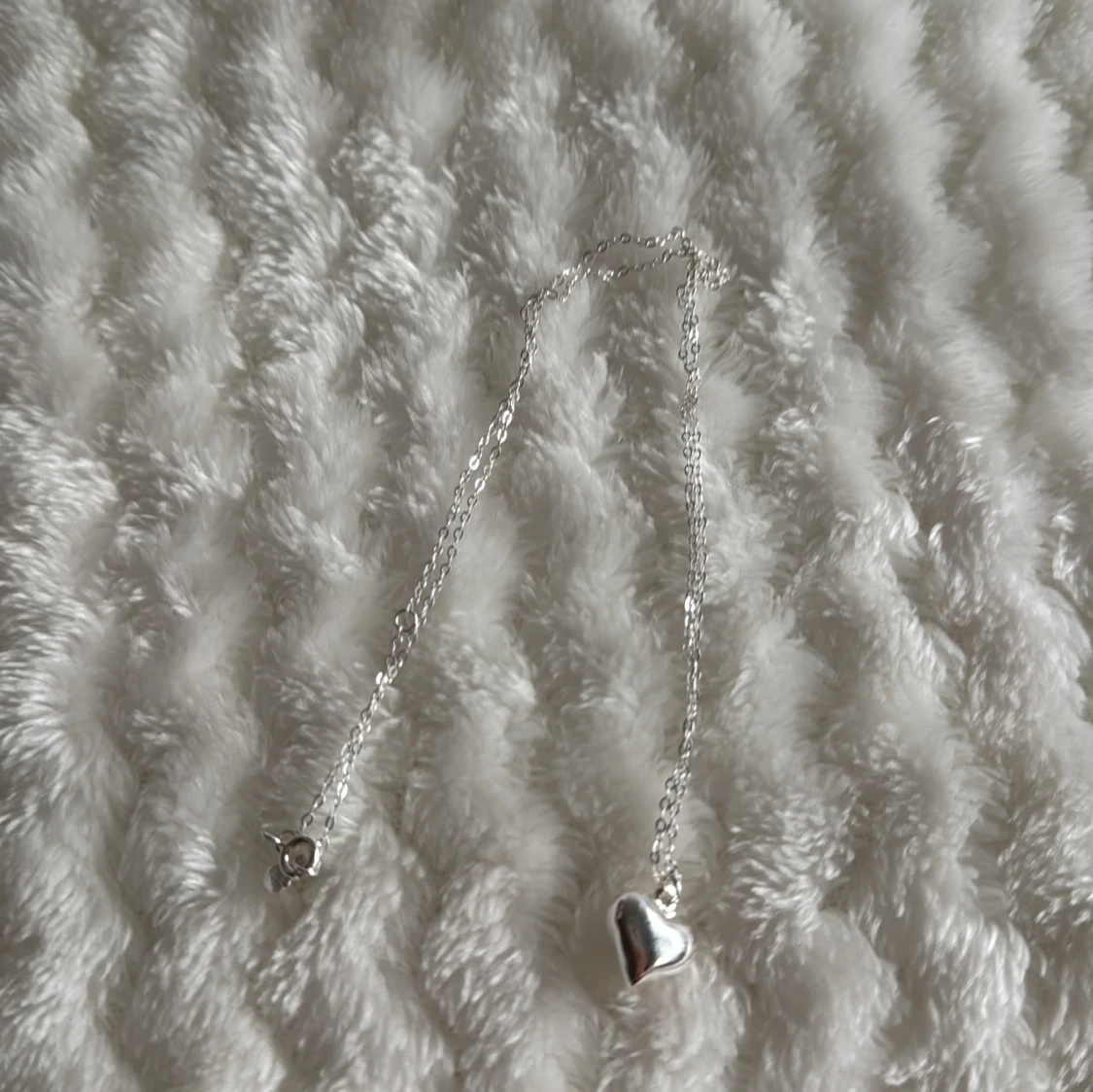 Halsband med en hjärta. - 90