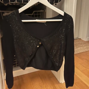 Glittrig bolero - Strl M, bra skick. Köpt second hand