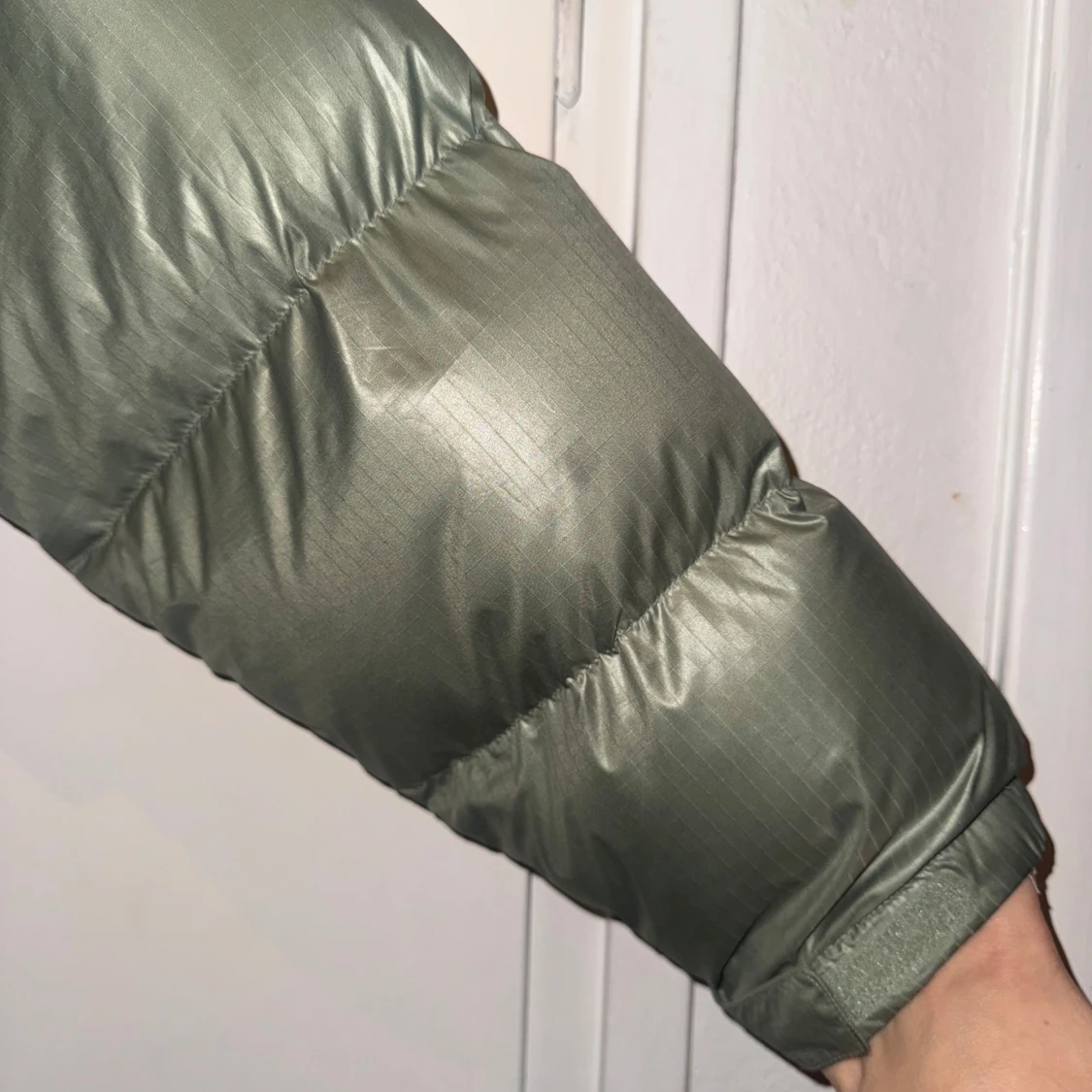 Grön och svart dunjacka från The North Face - 93