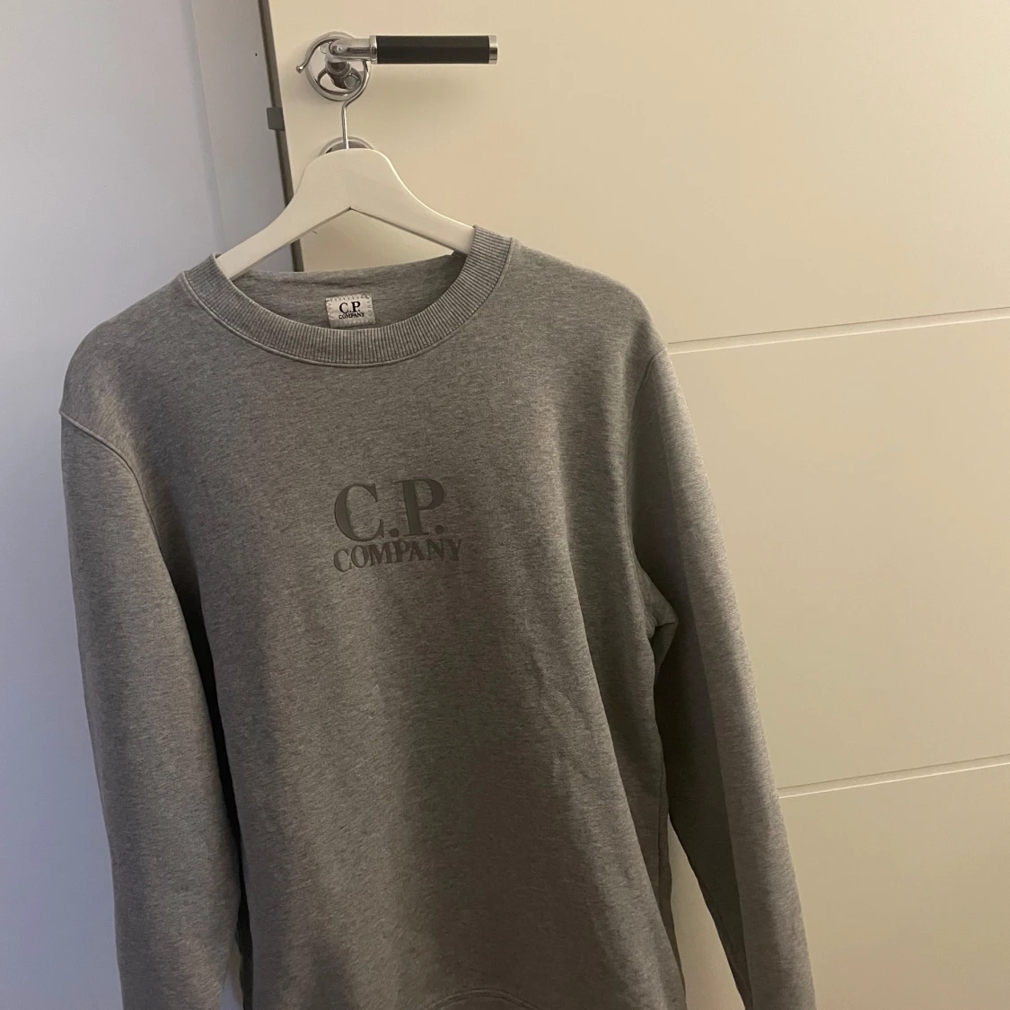 Grå sweatshirt från C.P. Company