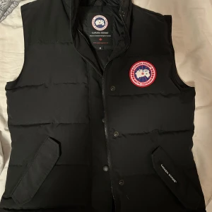 Canada Goose Freestyle crew - Äkta Canada Goose väst, unisex, oanvänd