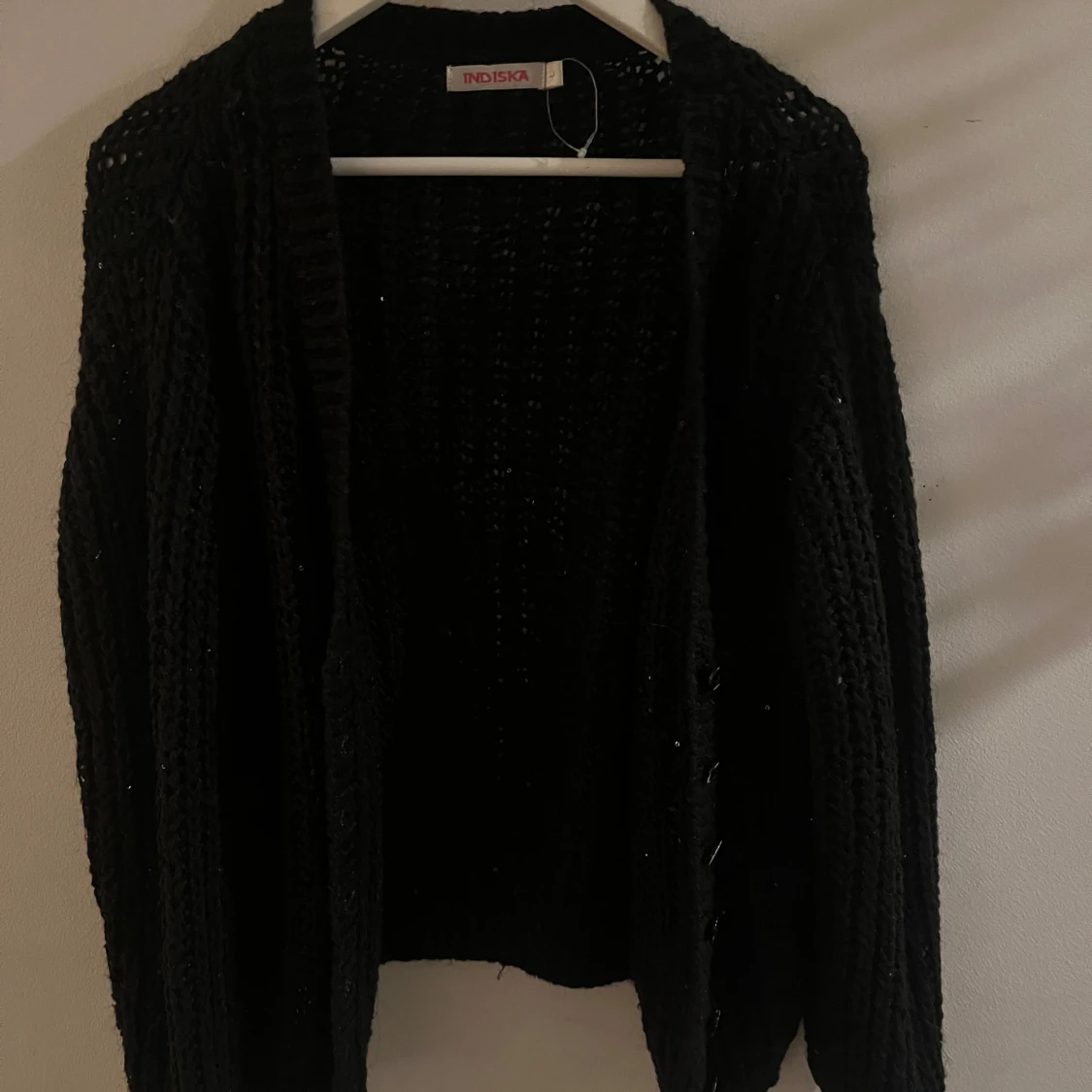 Svart stickad kofta från Indiska