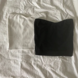 Tubtopp 2-pack  - Dessa tubtoppar kommer tyvärr inte till användning. Perfekta till ett par linnebyxor eller en söt kofta. Den vita har små fläckar som syns på bild 3 och 4(där jag pekar) samt missfärgning på bandet från brun utan sol på insidan(bild 5). 