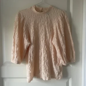 Trekvarts  blus - Aprikos färgad trekvarts blus 