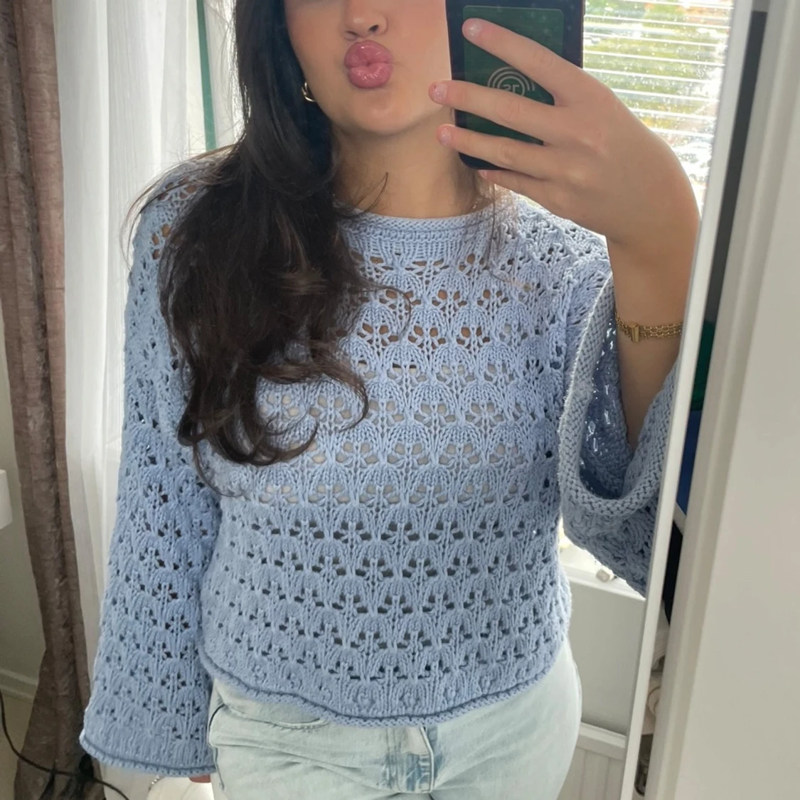 Stickad blå tröja 