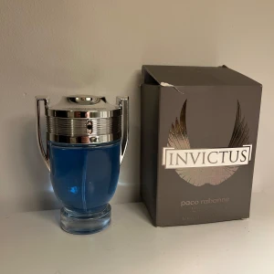 Invictus parfym från Paco Rabanne - Säljer min Invictus parfym från Paco Rabanne eftersom att den inte används. Skicka är bara testad och annars aldrig använd. 100ML flaska. Kom privat vid några frågor!