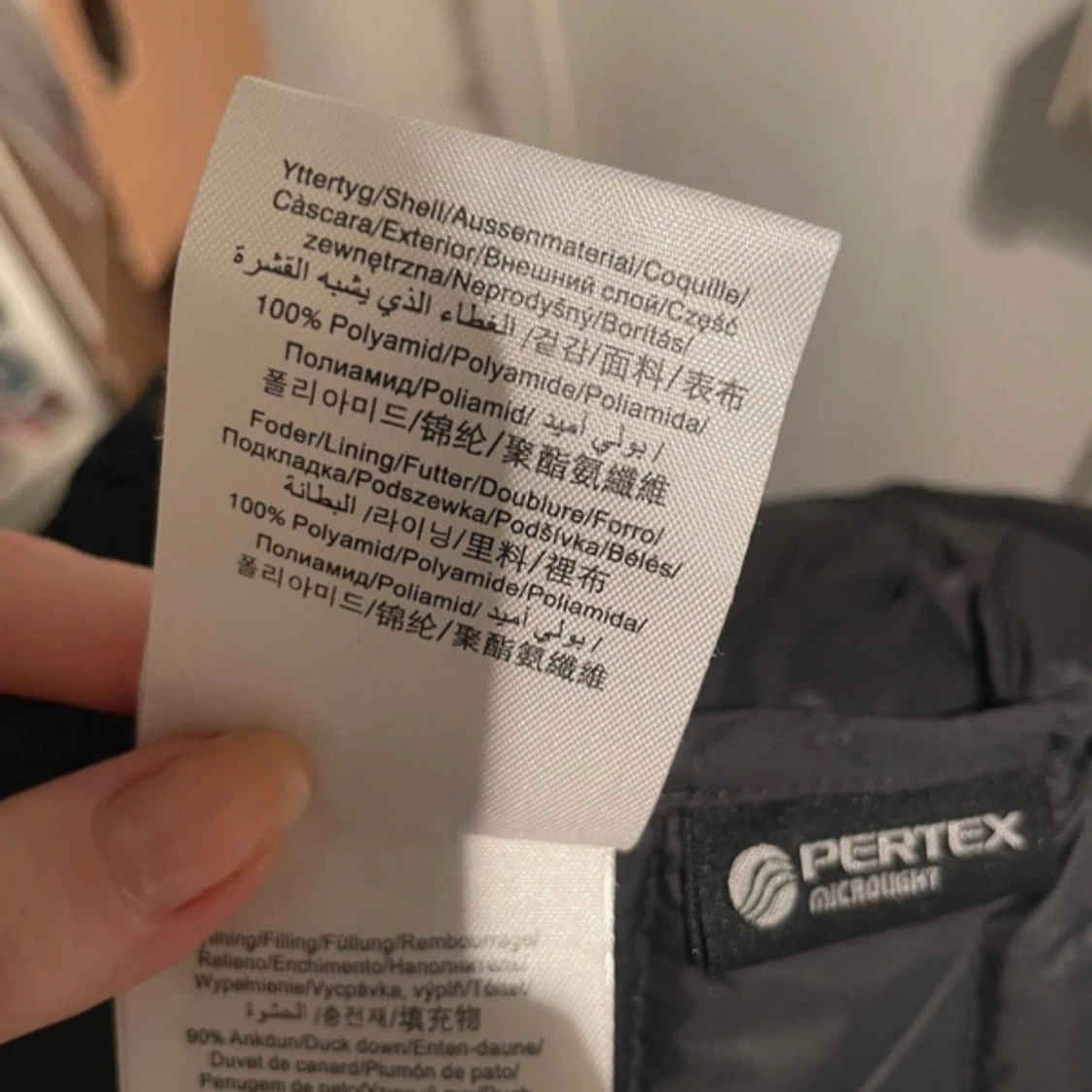 Svart dunjacka från Peak Performance - 93