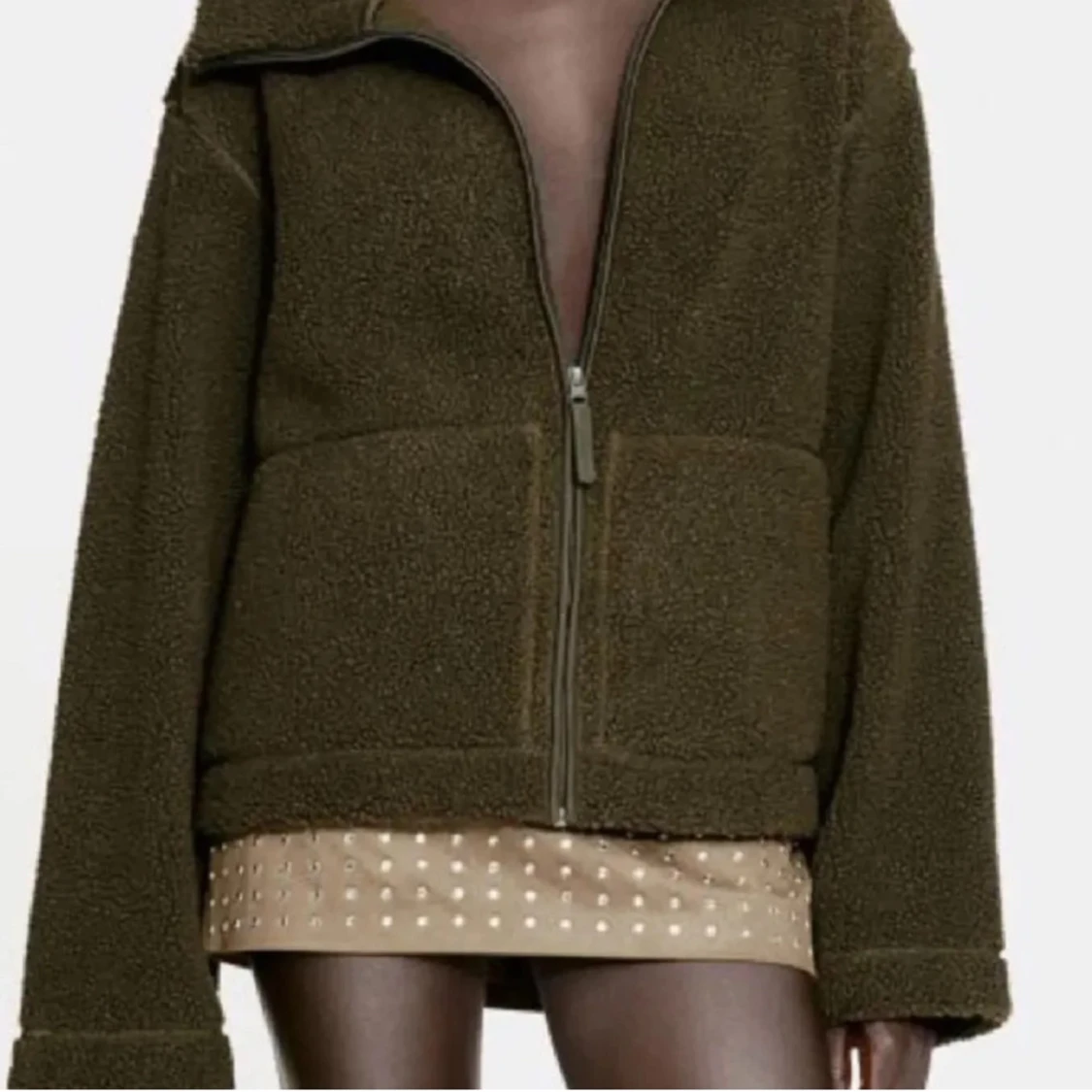 Olivgrön teddyjacka