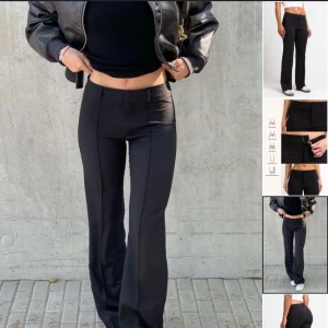 Lågmidjade kostymbyxor  - Säljer ett par till kostymbyxor i samma modell fast i storlek 34/tall! Super snygga och passar till allt. Ena fästet för att knäppa kostymbyxorna är lite lös men sitter fortfarande på helt!