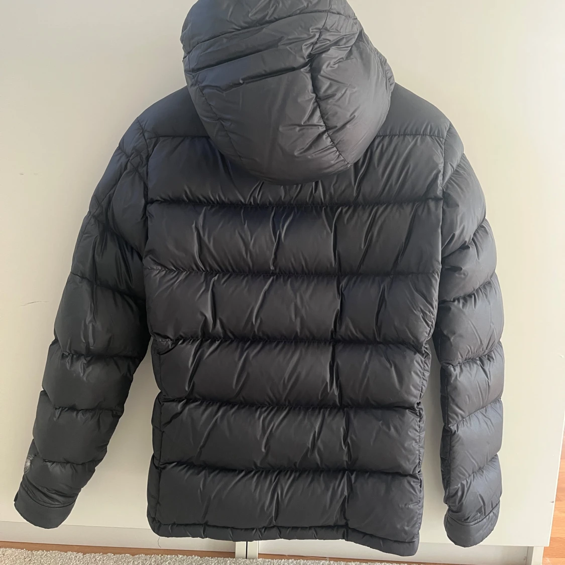 Svart dunjacka från Peak Performance - 91