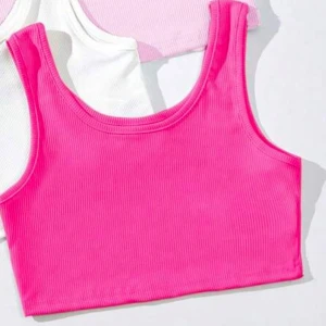 Rosa ribbad linnetopp - Snygg och trendig rosa ribbad linnetopp. Perfekt för varma dagar med sin ärmlösa design och croppade längd. Ett måste i garderoben för en färgglad touch!