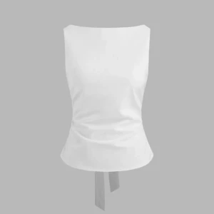 Vit knytt-topp - Snygg vit ärmlös topp från cider med en elegant knytning i ryggen. Toppen har en öppen rygg och är perfekt för en stilren look. Materialet är mjukt och bekvämt.