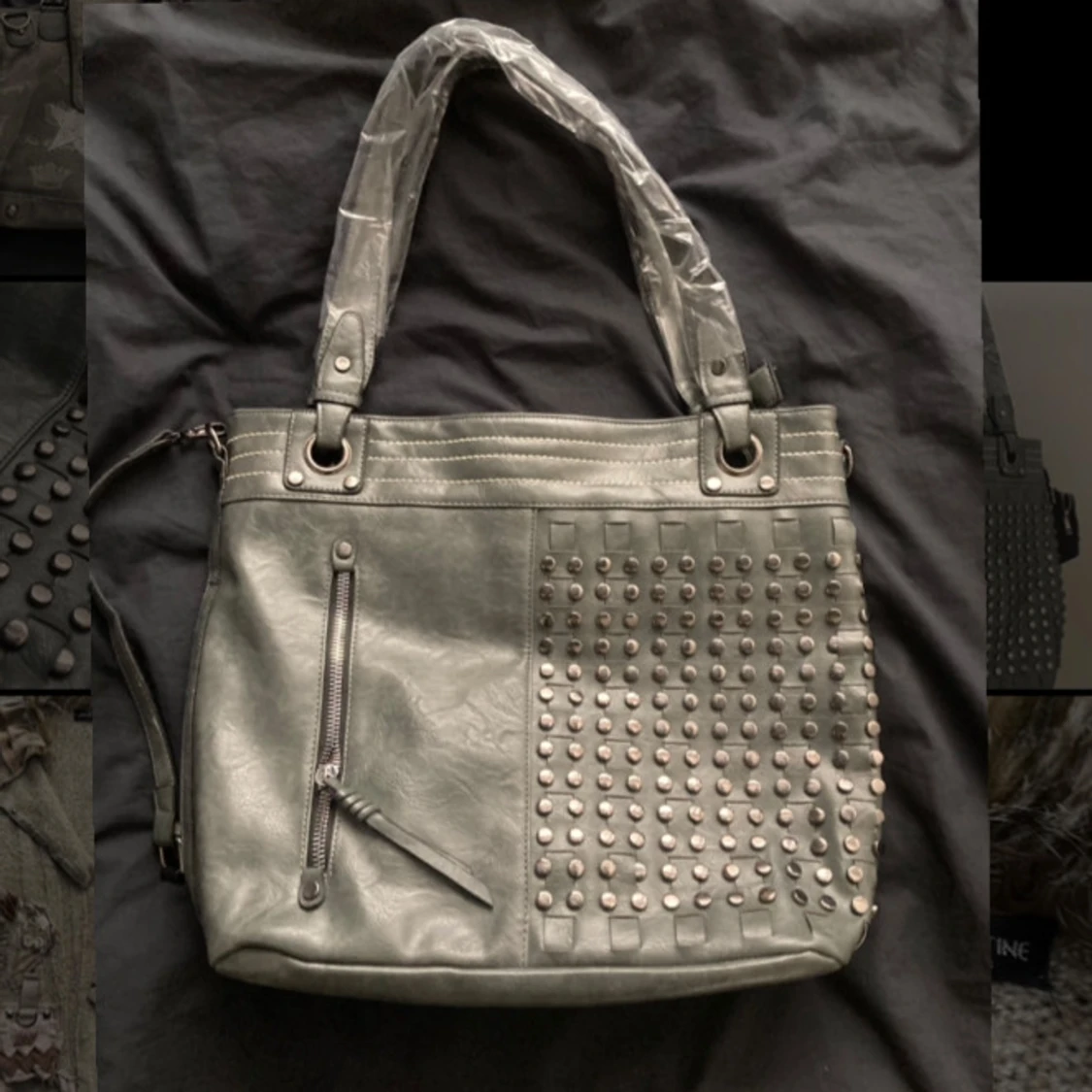 Grå axelväska med nitar