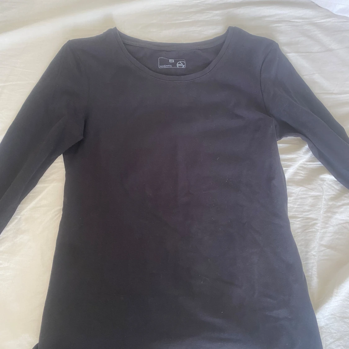 Svart långärmad tröja från Uniqlo