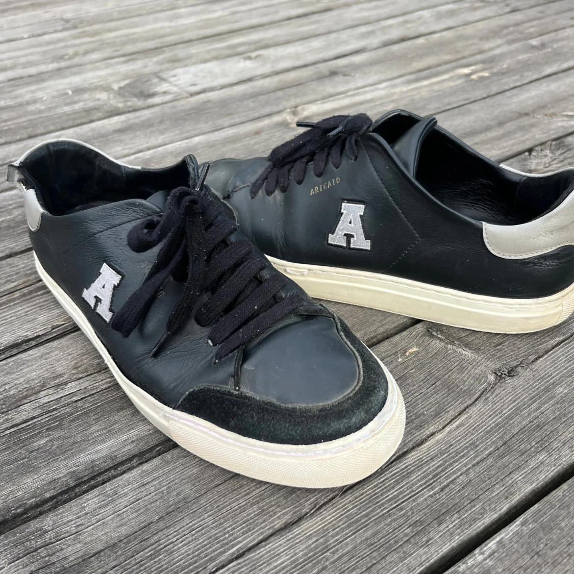 Axel Arigato skor
