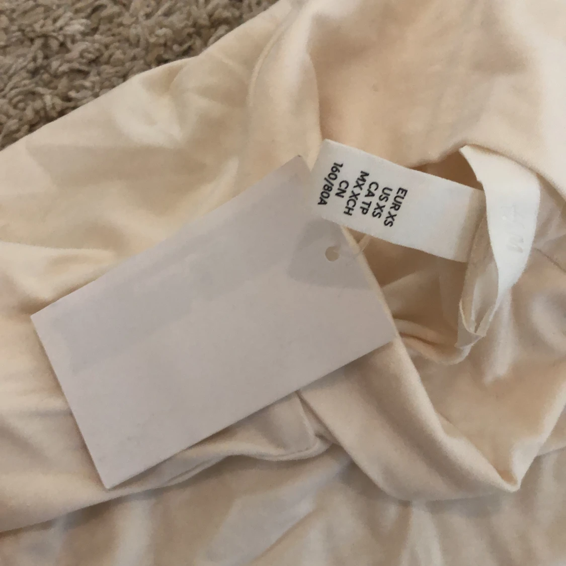 Vit polotröja från H&M - 92