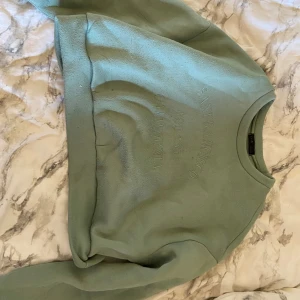 Mintgrön långärmad magtröja  - Använd en del, inte nyskick, skönt material